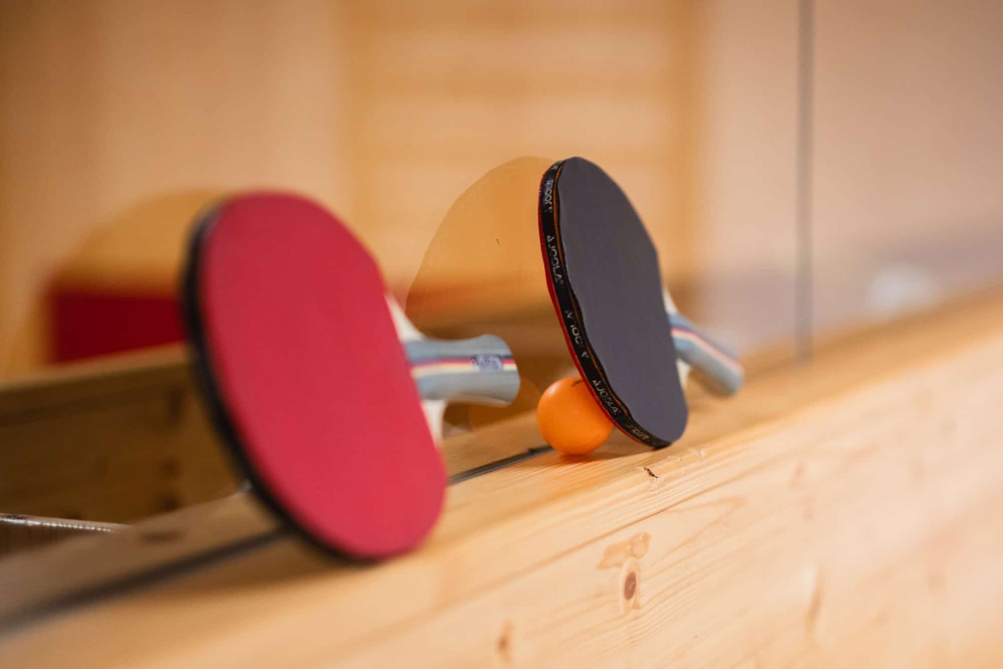 Playing ping pong together in the large children's play area of the 4-star Hotel Alpenhof Naturglück