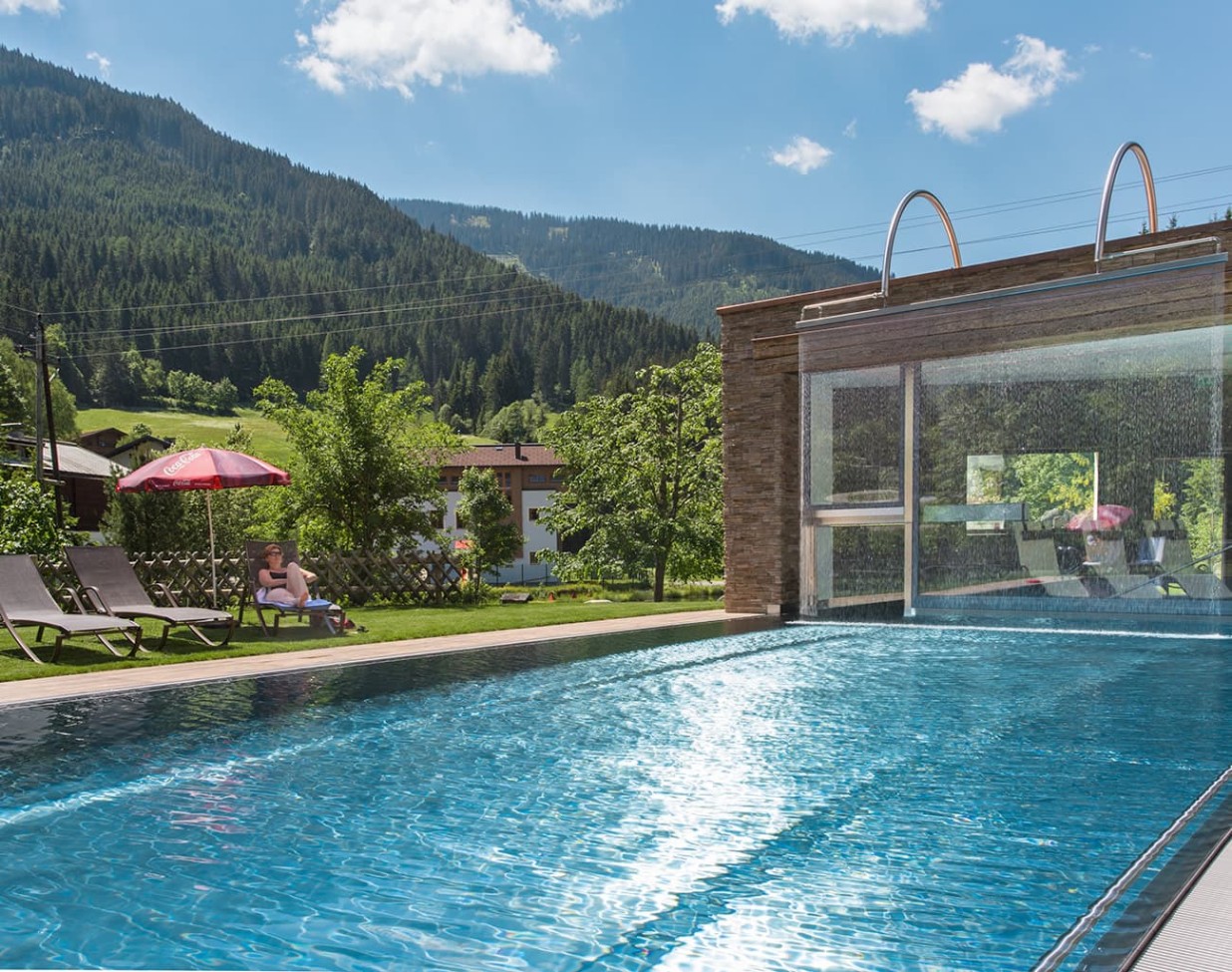 heated outdoor pool at Alpenhof Naturglück