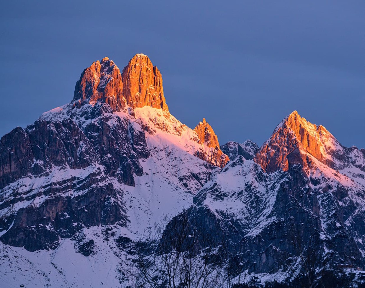 Sunrise behind the majestic Bischofsmütze, the local mountain of Filzmoos