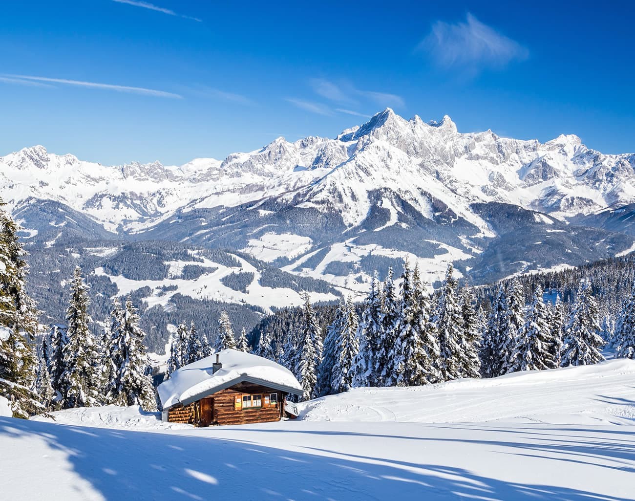 Sunrise behind the majestic Bischofsmütze, the local mountain of Filzmoos