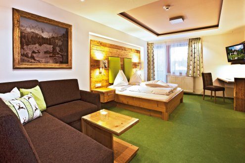 Die Zimmer Dachstein - eine gemütliche Kombination aus Altholz und Moderne.